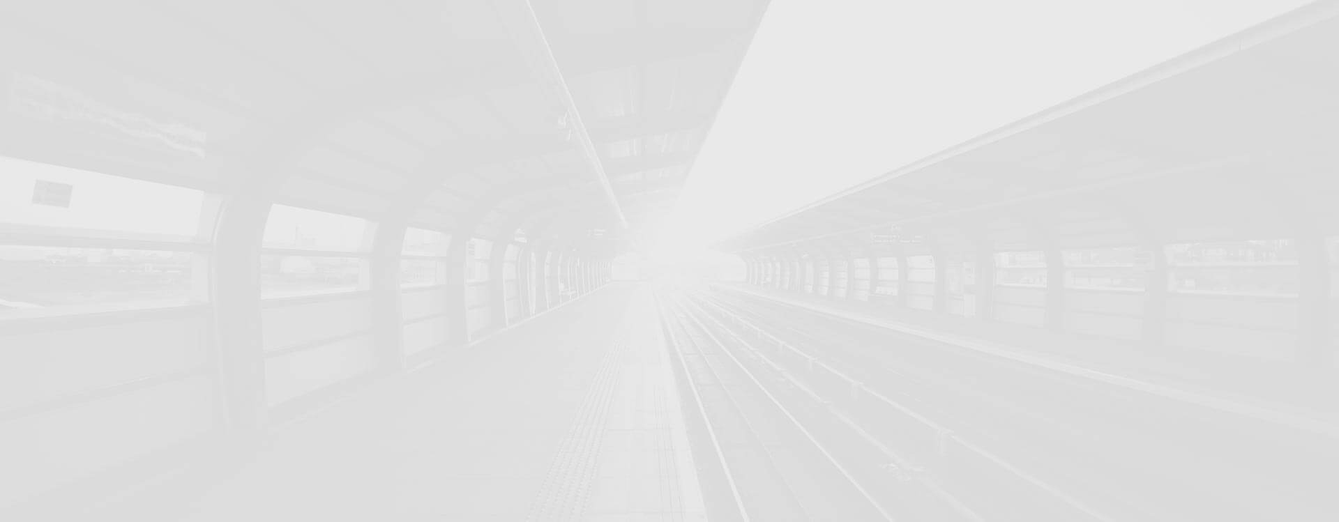 Tło sekcji z poruszającymi się wagonami.